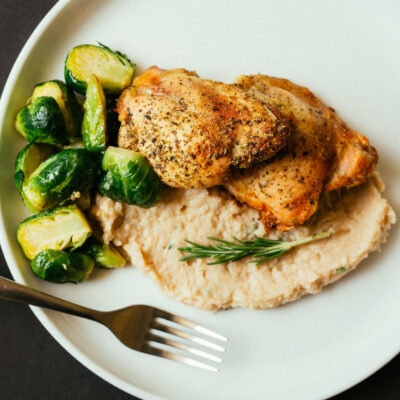 Chicken and Brussels Sprouts over Cannellini Beans and Rosemary Mash<br>Delivery January 13-17