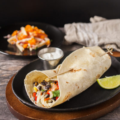 Black Bean and Vegetable Burrito with Clementine and Jicama Salad with Cheese and Pepitas<br>Delivery February 17-21