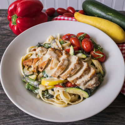 Chicken and Vegetable Alfredo with Balsamic and Basil-Sautéed Grape Tomatoes<br>Delivery May 26-30