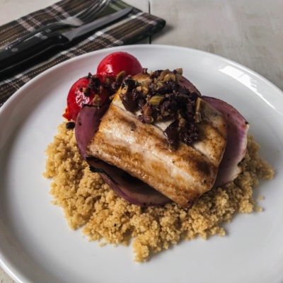 Mahi-Mahi with Charred Onion, Roasted Tomatoes and Tapenade Vinaigrette with Parmesan Couscous<br>Delivery July 14-18