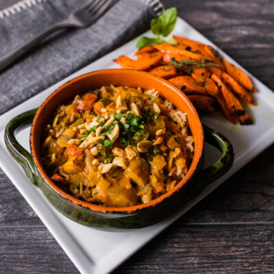 Spicy Peanut Stew with Ginger and Tomato over Steamed Rice with Turmeric and Cumin-Roasted Carrots<br>Delivery July 21-25