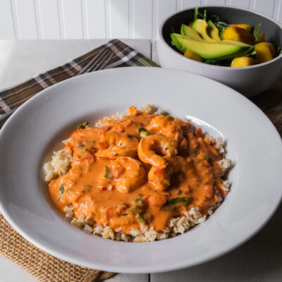 Brazilian-Style Shrimp in Coconut Sauce over Steamed Rice with Arugula with Avocado, Broiled Pineapple and Cider Vinaigrette<br>Delivery May 26-30